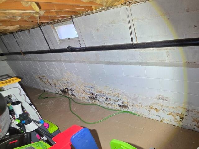 Waterproofing Solution For a Basement in Manalapan, NJ - Before Photo