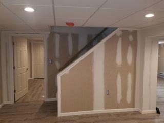 Finishing a Newark, DE Basement with Waterproof Products and an Egress Window