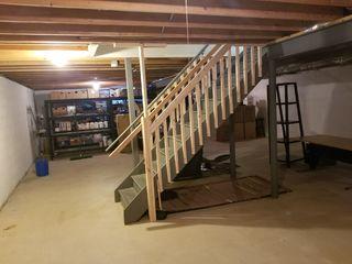 Finishing a Newark, DE Basement with Waterproof Products and an Egress Window