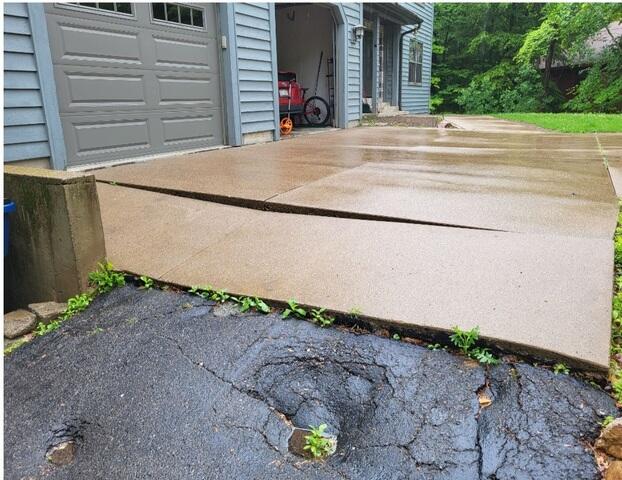Concrete Driveway Lifting & Concrete Repair - Wausau, WI - Before Photo
