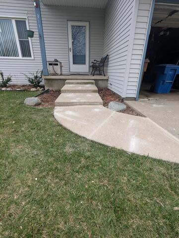 Sunken Unsafe Concrete Driveway Repaired Using Poly Level Foam in Menasha, WI - After Photo