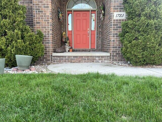 Concrete Walkway Lifted and Leveled in De Pere, WI - Before Photo