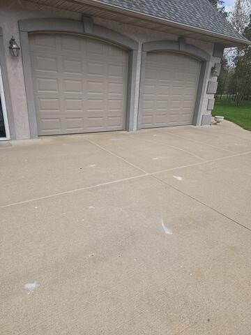 Concrete Driveway Lifted, Leveled, and Sealed in Nekoosa, WI - After Photo