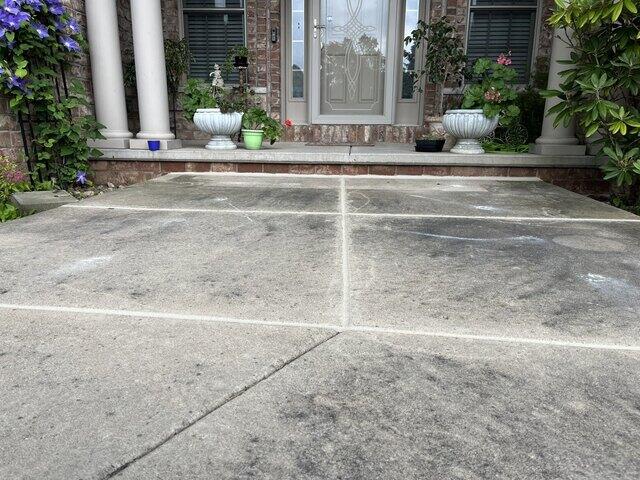 Sunken & Unlevel Concrete Lifted, Repaired & Joints Sealed in Neenah, WI - After Photo