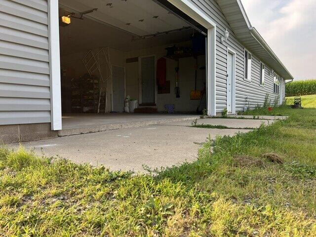 Cracked Concrete Garage Apron Lifted and Leveled in Birnamwood, WI - Before Photo