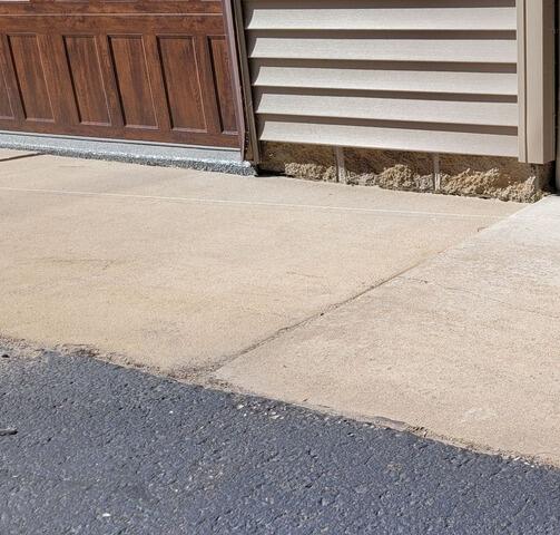 Concrete Lifting and Joint Sealing in Minocqua, WI - Before Photo
