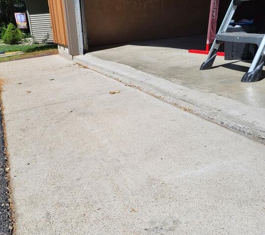 Concrete Driveway Repair In Gillett, WI - Before Photo