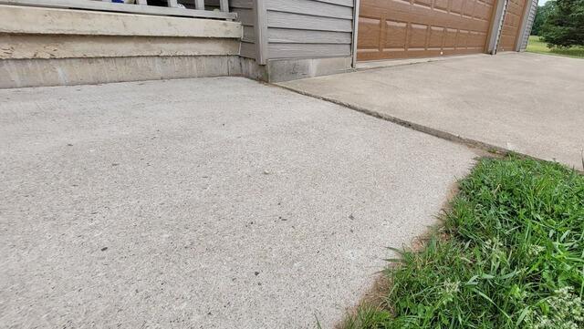 Concrete Patio Repair In Oconto Falls, WI - Before Photo
