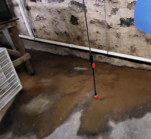 Wet Basement Waterproofing for a Farmhouse in Athens, WI - Before Photo