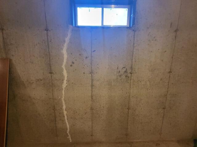 Horizontal Foundation Cracks Repaired & Stabilized In Nekoosa, WI - Before Photo