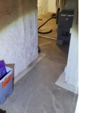 Basement Water Control System Solves Moisture Issues In Ringle, WI - Before Photo