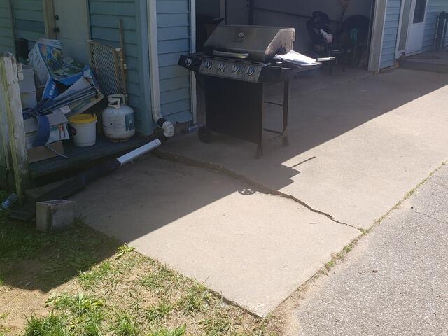 Uneven Concrete & Crack Repair in Ringle, WI - Before Photo