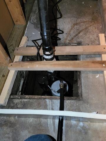 Sump Pump System Replacement in Schofield, WI - Before Photo