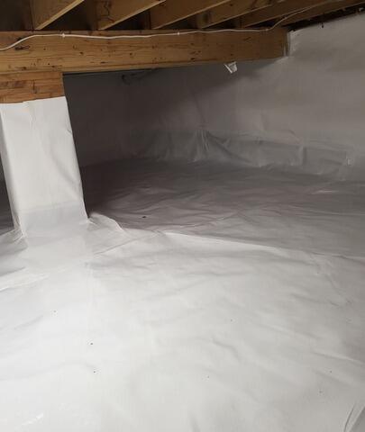Musty Crawl Space Issues Resolved with Encapsulation Lining and Air Purification System in Keshena, WI - After Photo