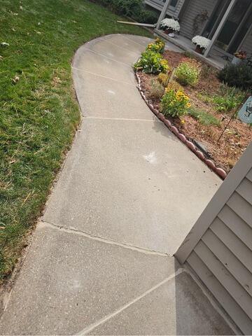 Cracked, Uneven Concrete Lifted and Cracks Sealed in Wautoma, WI - After Photo