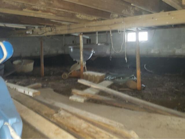 Crawlspace Encapsulation & Water Control System Installed in Wautoma, WI - Before Photo
