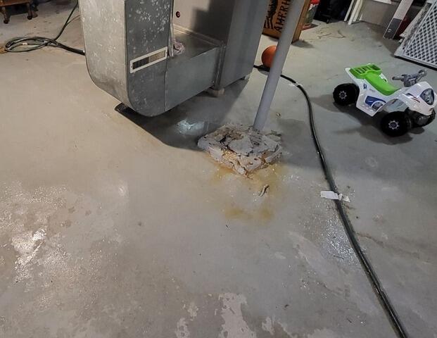 Wet Basement Receives Makeover With Sump Pump and Water Control System Installation In Clintonville, WI - Before Photo