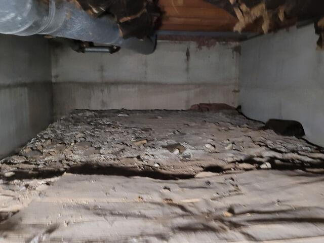 Crawlspace Encapsulated & Insulated to Remove Cold, Damp Air in Clintonville, WI - Before Photo