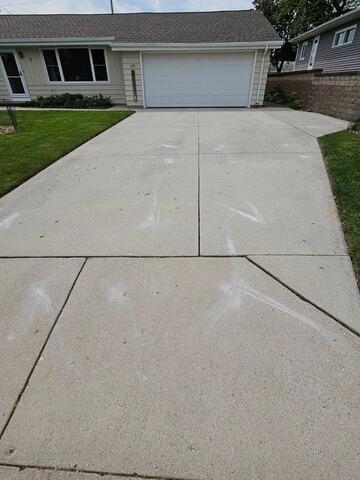 Uneven, Cracked Concrete Driveway Leveled & Stabilized In Plymouth, WI - After Photo