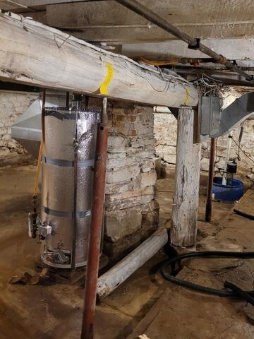 SmartJack Installation Repairs Sagging Floors In Brussels, WI - Before Photo