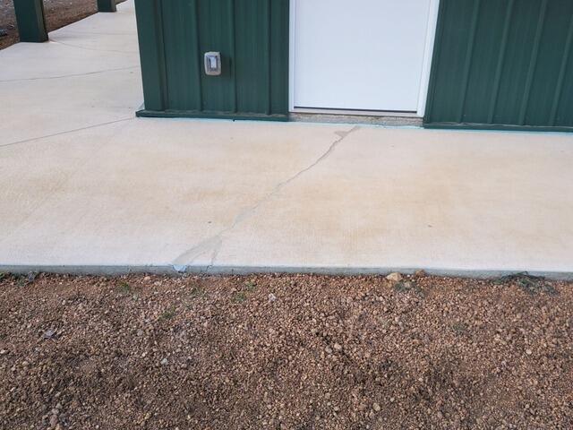 Concrete Patio Cracks Evened Out & Sealed in Elton, WI - After Photo