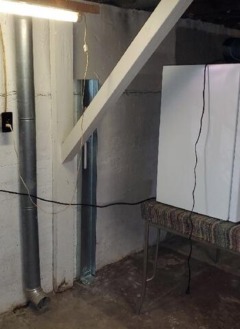 Failing Foundation Repaired Using GeoLock Wall Anchors in Pearson, WI - After Photo