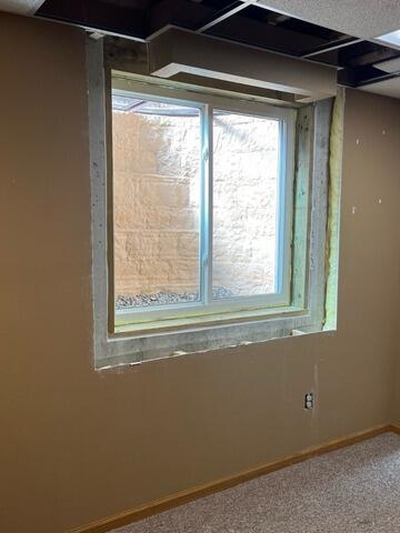 Basement Bedroom Remodel Complete with Egress Window Install in Sheboygan, WI - After Photo