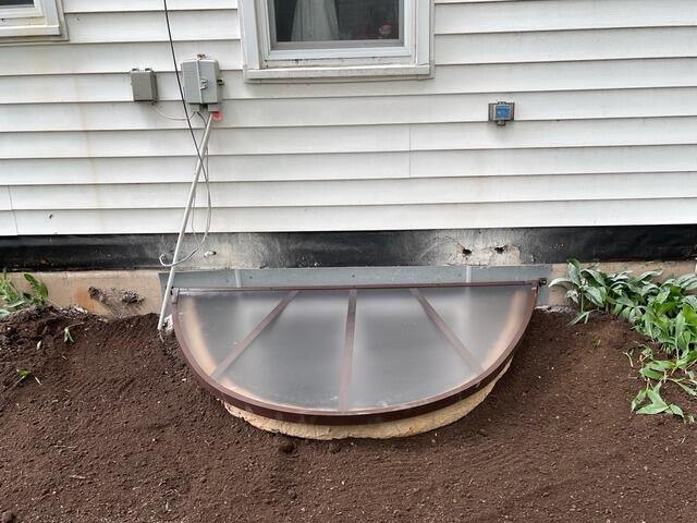 Egress Window Installation Completes Basement Bedroom Remodel in De Pere, WI - After Photo