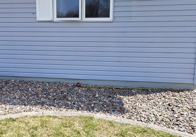 Egress Window Well System Installation in HIlbert, WI - Before Photo