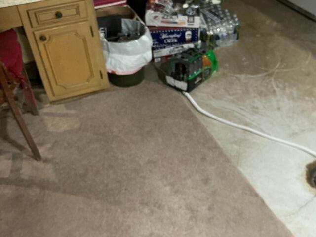 Damp Basement Repaired with Dehumidifier Installation in Fond Du Lac, WI - Before Photo