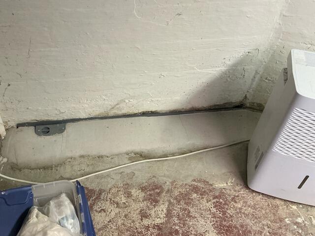 Musty Basement Repaired With new Dehumidifier Installation in Stanley, WI - Before Photo