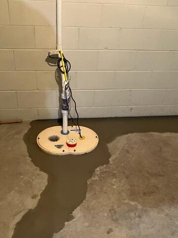 Wet Basement Repaired with Upgrades Sump Pump and Water Control System in Kronenwetter, WI - After Photo