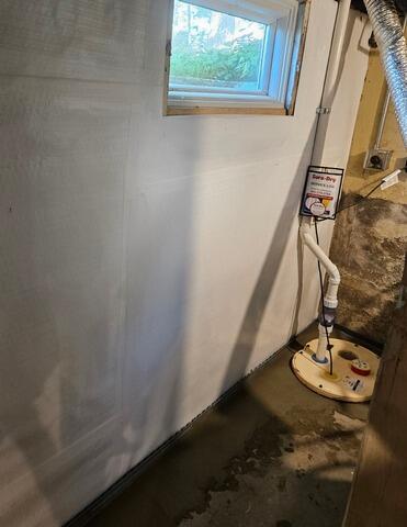 Wet Basement Repaired with Waterproofing System Installation in Eagle River, WI - After Photo