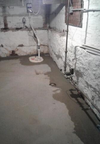 Basement Waterproofing with Battery Back-up Sump Pump and Drainage System in Menasha, WI - After Photo