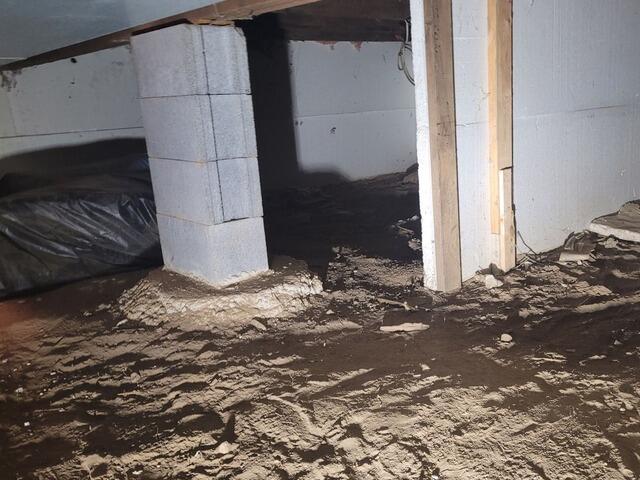 Damp Musty Crawlspace Repaired & Stabilized in Eagle River, WI - Before Photo