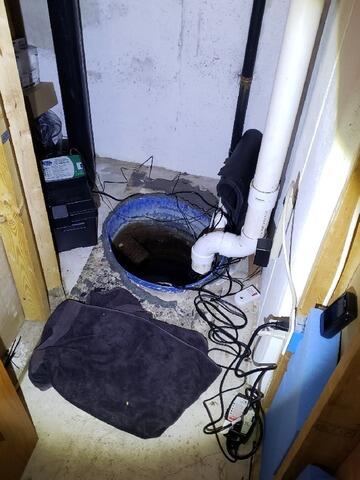 Sump Pump Installation in Suamico, WI - Before Photo