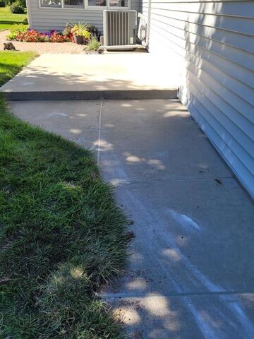 Uneven Concrete Driveway Lifted and Leveled in Greeville, WI - After Photo