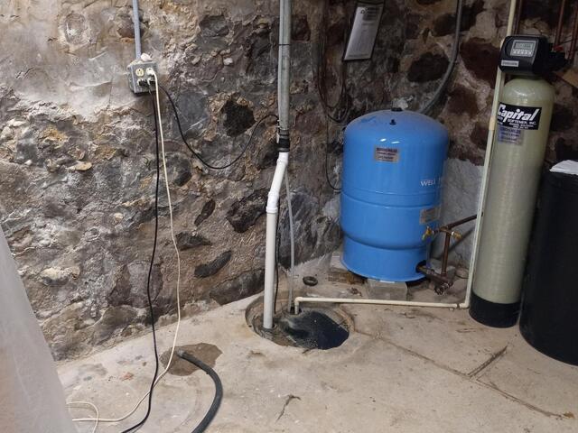 Wet Basement Repaired by Contractor in Campbellsport,WI - Before Photo