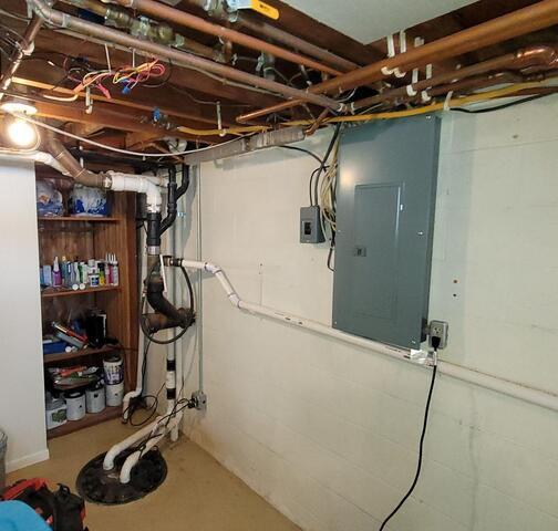 Complete Waterproofing & Sump Pump System Upgrade Eliminate Basement Water Issues in Porterfield, WI - Before Photo