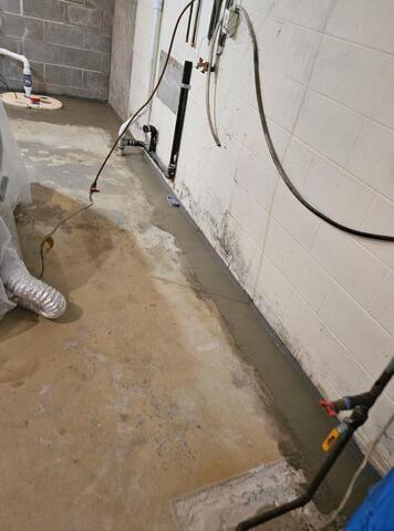 Complete Waterproofing & Sump Pump System Upgrade Eliminate Basement Water Issues in Porterfield, WI - After Photo