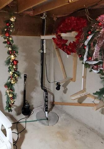 Wet Basement Waterproofing with Sump Pump & Drainage System in Little Chute, WI - Before Photo