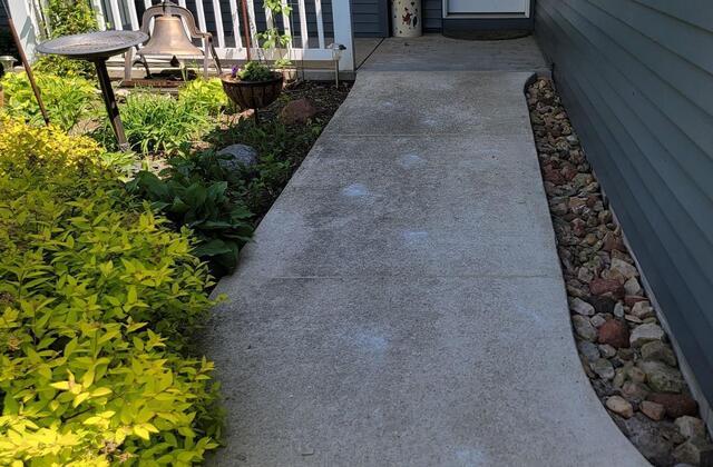 Concrete Walkway Lifted, Leveled and Joints Sealed in Malone WI - After Photo