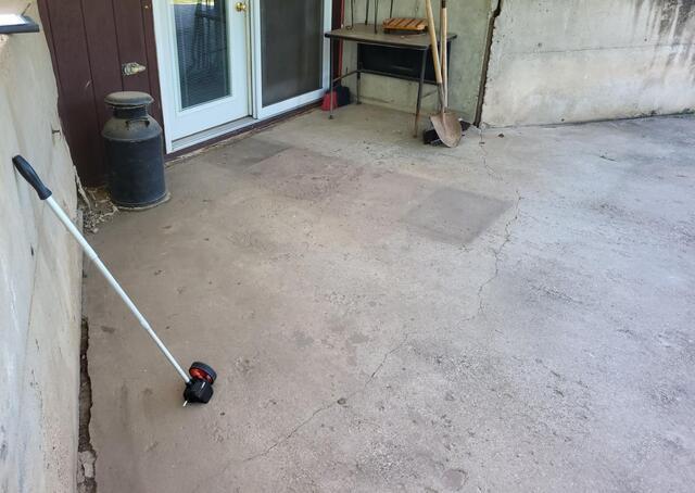 Concrete Lifted, Leveled and Sealed in Pine River, WI - Before Photo