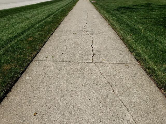 Local Sidewalk Repair Experts in Brillion, WI - Before Photo