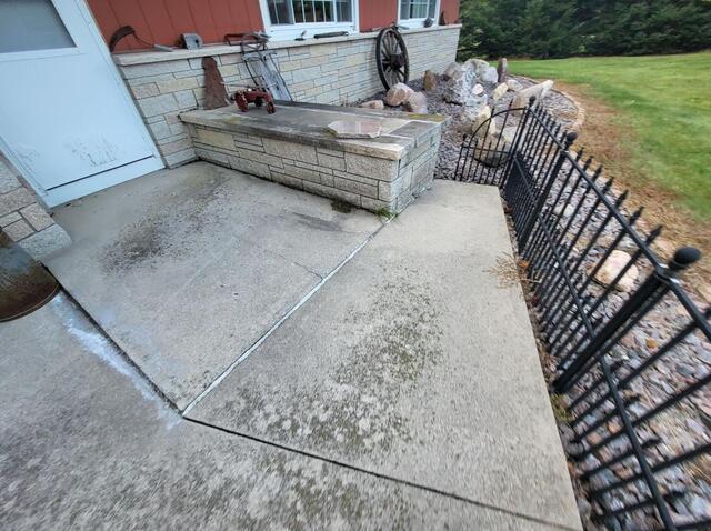 Uneven Concrete Stabilized & Sealed in Allenton WI - Before Photo