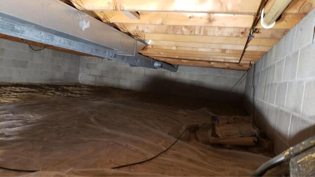 Crawl Space Moisture and Insulation Issues Resolved in Lomira, WI - Before Photo