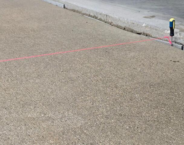 Concrete Lifted and Leveled with PolyLevel Injection Foam in Eldorado, WI - Before Photo