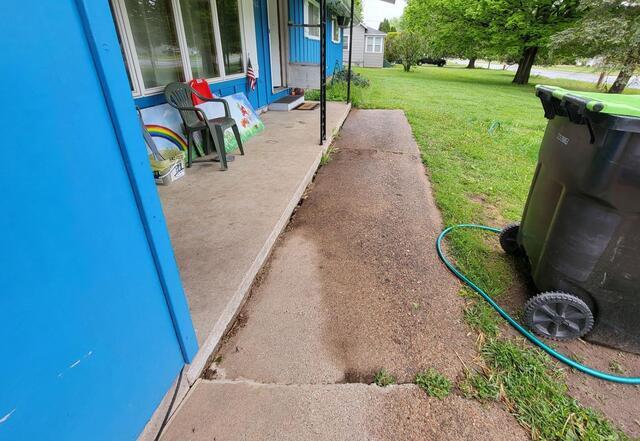 Concrete Lifted with PolyLevel Foam  in Manawa, WI - Before Photo