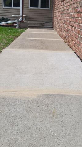 Concrete Walkway Lifting and Joint Sealing in Shawano, WI - After Photo