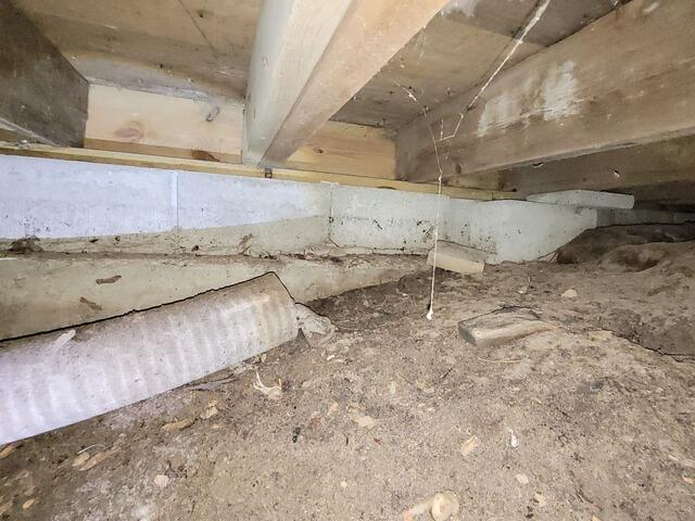 Musty Crawlspace Encapsulated & Waterproofed in Shawano, WI - Before Photo